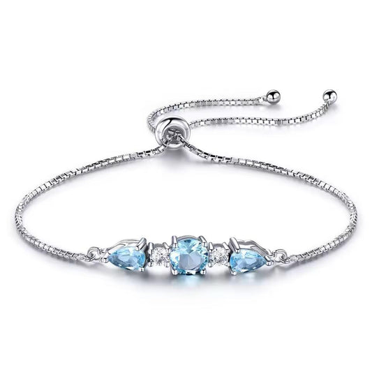 IRAMAT 925 Sterling Silver Sky Blue Topaz Tennis Bracelet - Adjustable Fine Jewelry for Women - Perfect Gift for Weddings & Parties